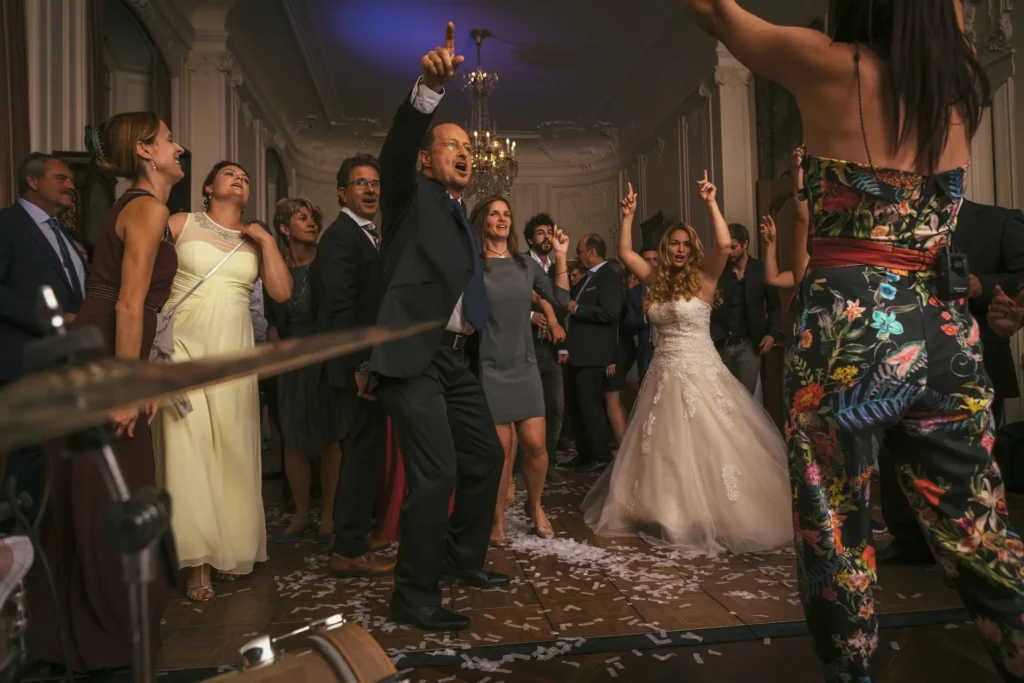 Wedding guests dancing to the live band MAXiN